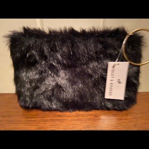Faux fur wristlet clutch